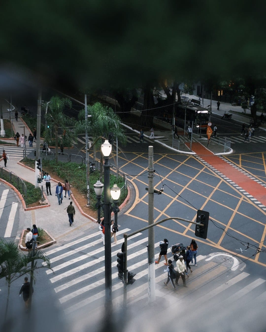 Looking down on a pedestrian crossing, the edges softly blurred